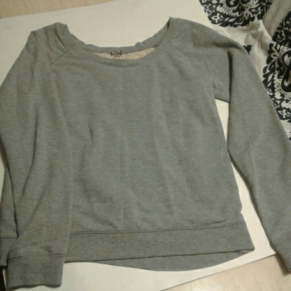 Girls grey lace back medium shirt.